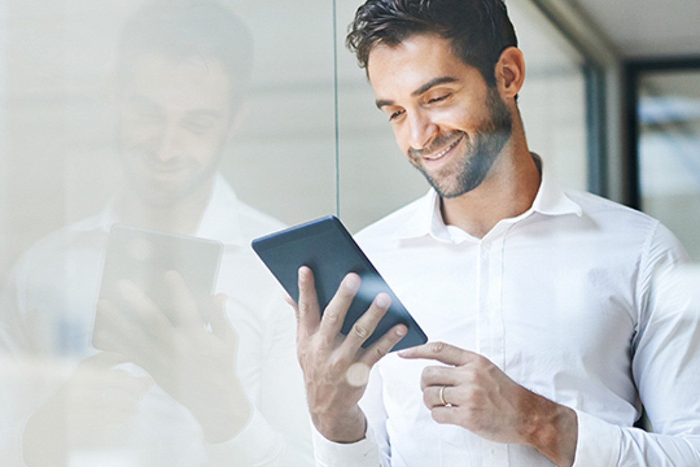 Sureprep Portrait 1 man working on tablet