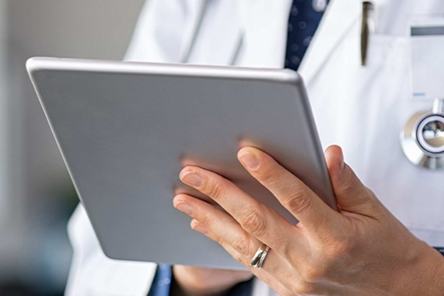doctor holding a tablet 