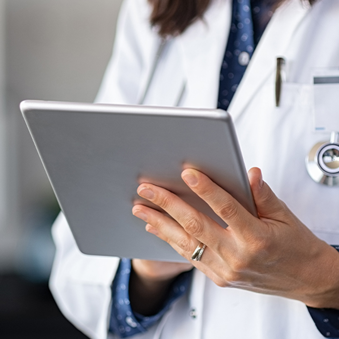 doctor holding a tablet