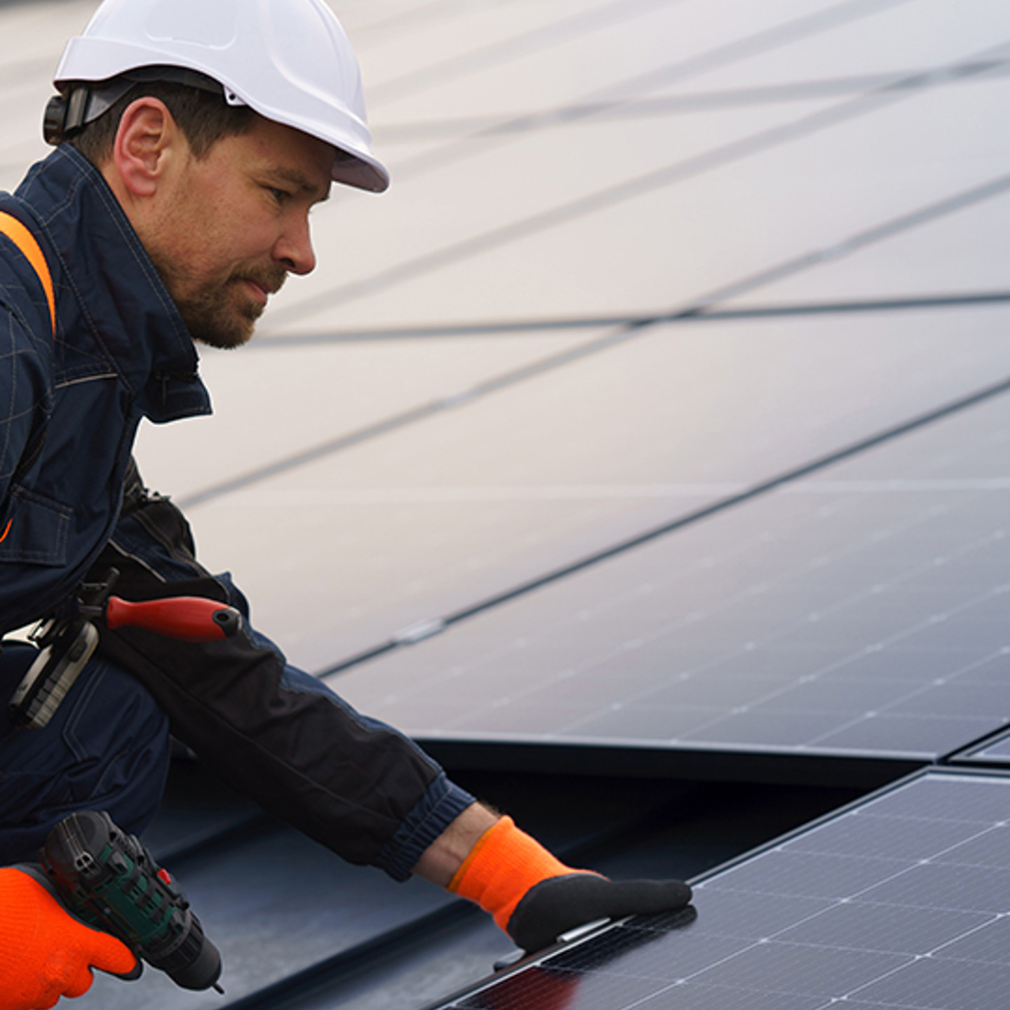 Solo Portrait 1 man installing solar panels