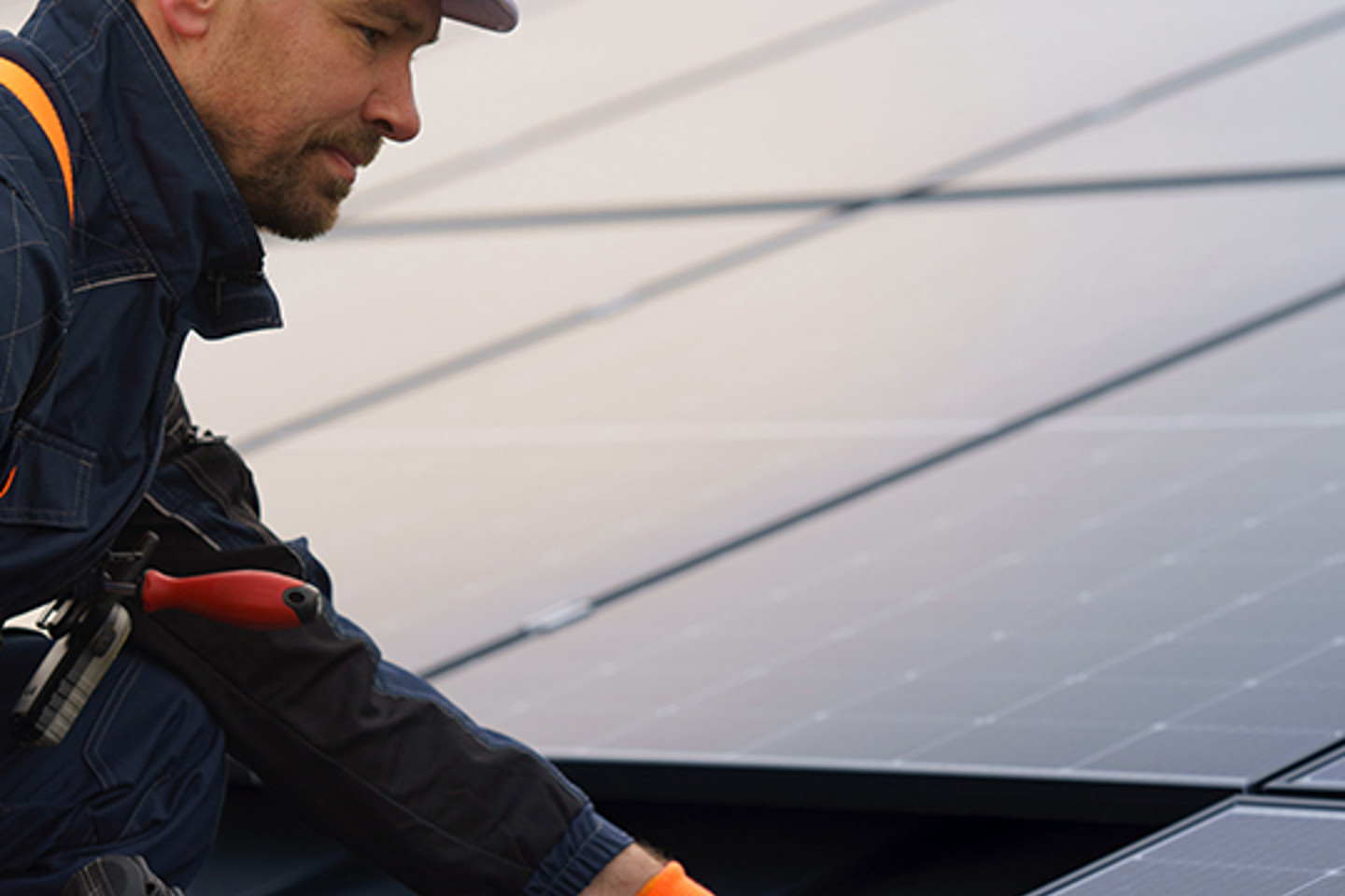 Solo Portrait 1 man installing solar panels