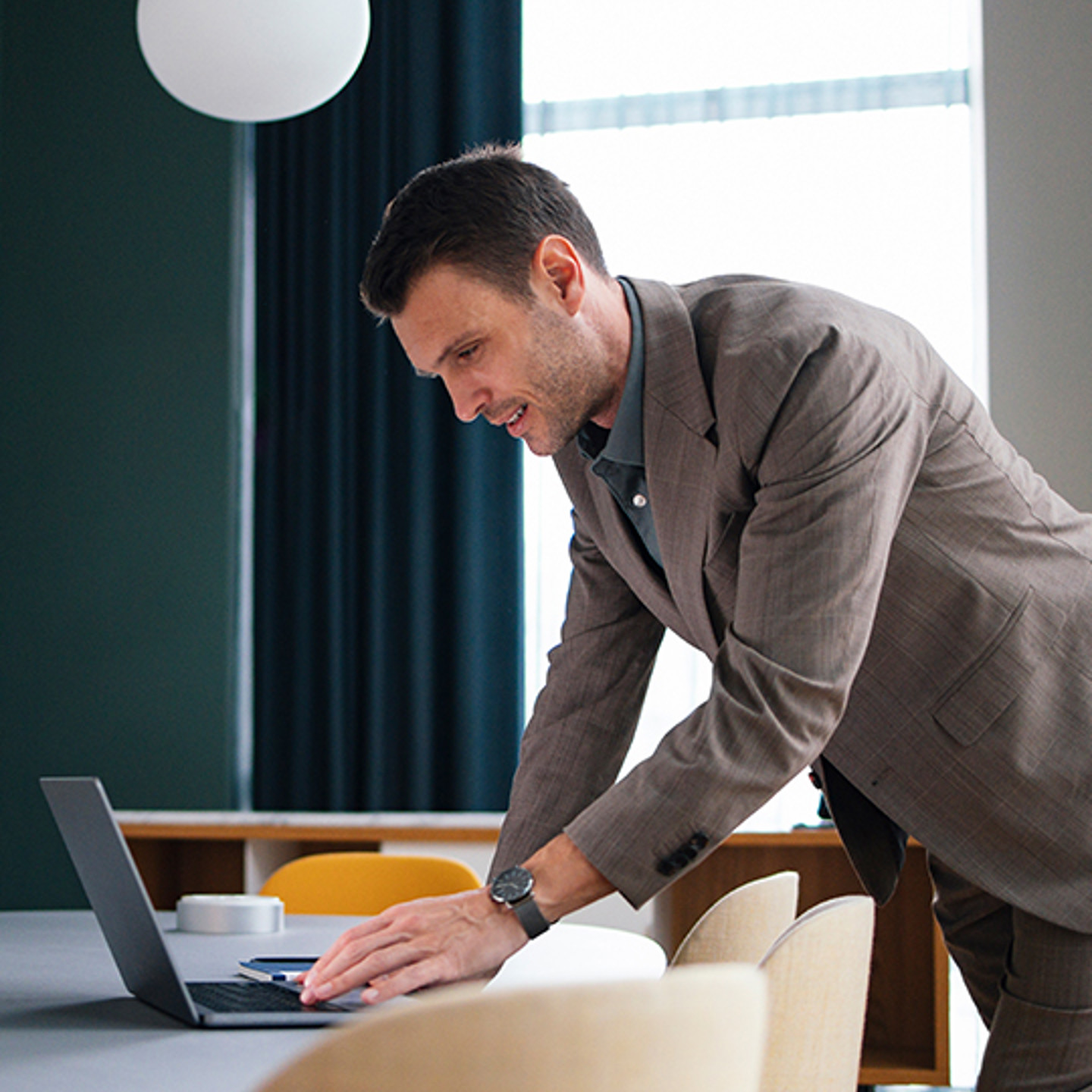 Anywhere 365 Portrait 3 man with laptop