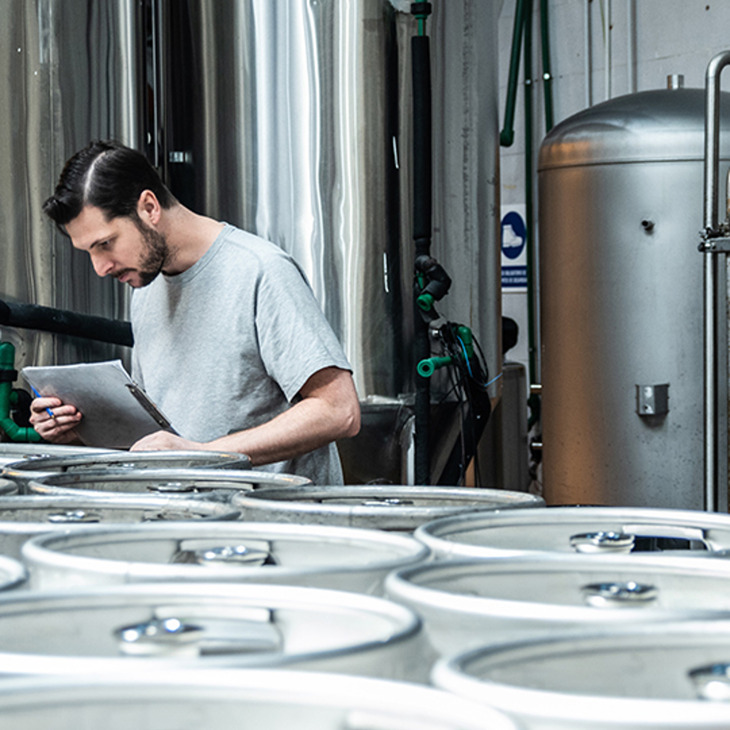 Keg Logistics Portrait 2 man inspecting kegs