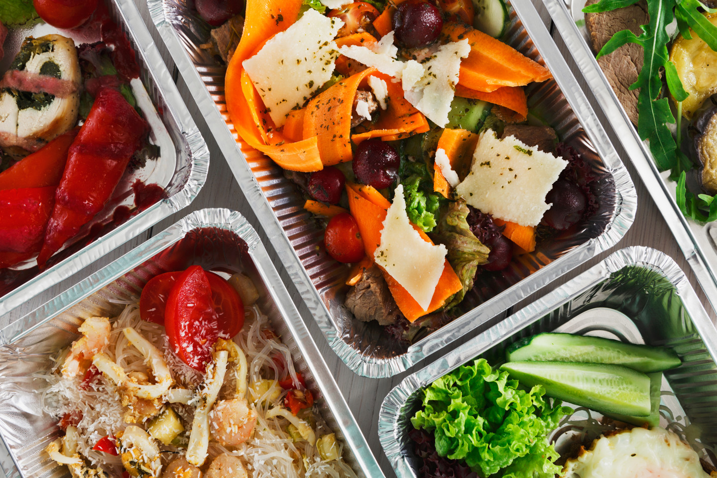 Bregal Helps landscape food containers filled with food