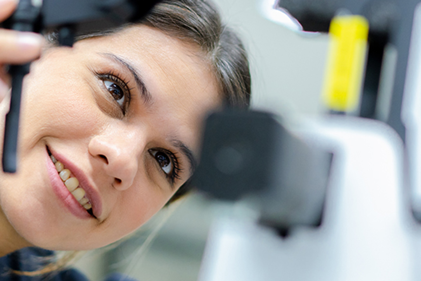 Lux Research Portrait 3 woman inspecting technical gear