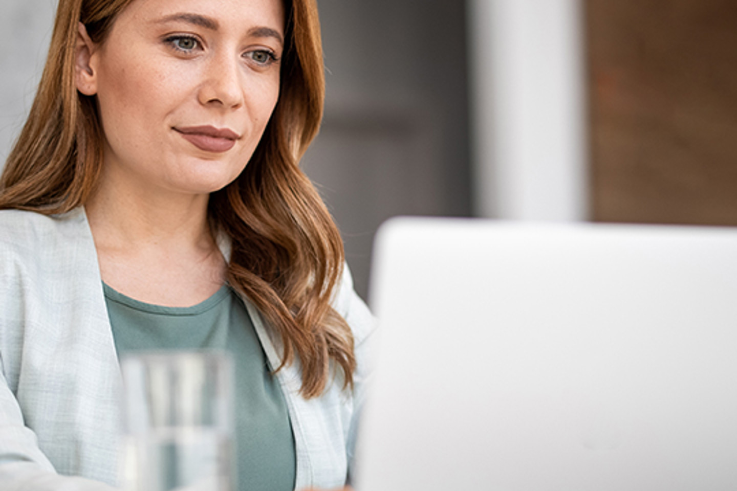Steele Portrait 3 woman working on laptop