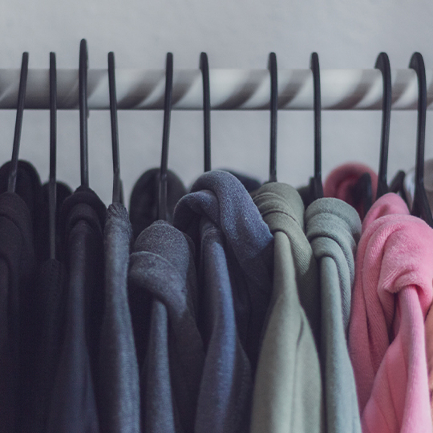 Printful Portrait 1 clothers hung up on clothes rail