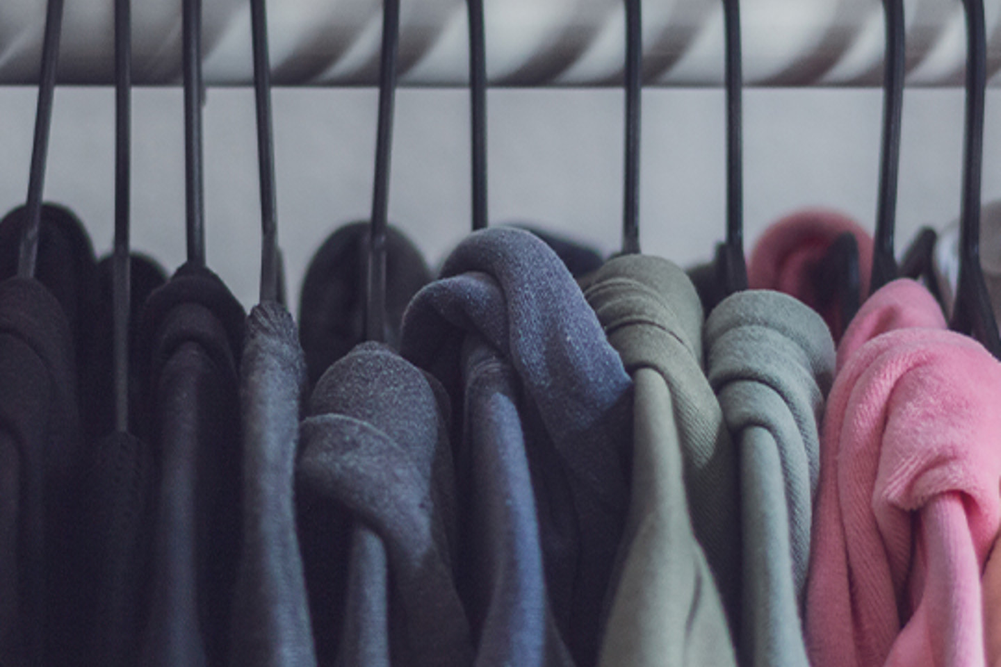 Printful Portrait 1 clothers hung up on clothes rail