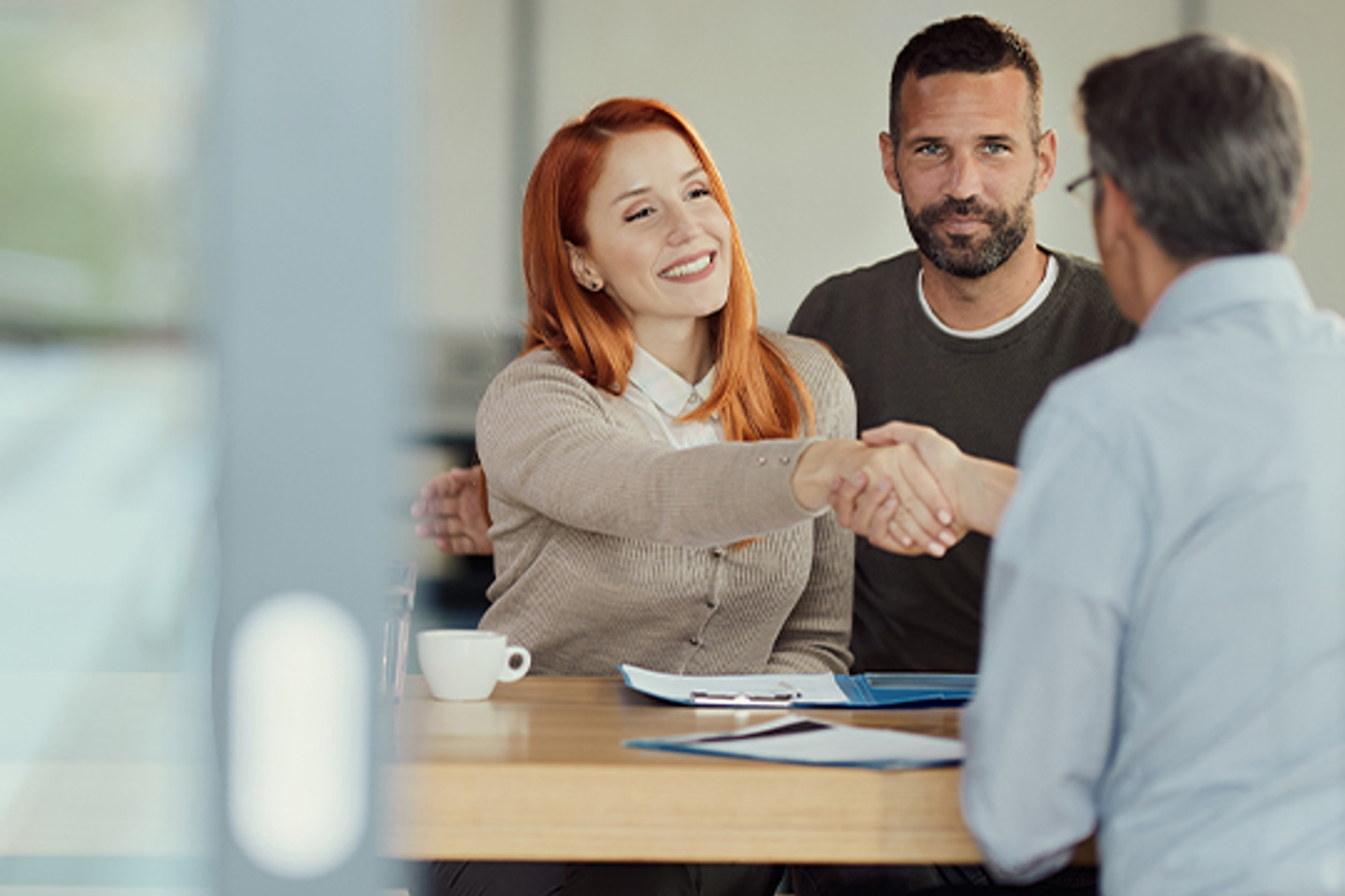 Openlending Portrait 3 people shaking hands
