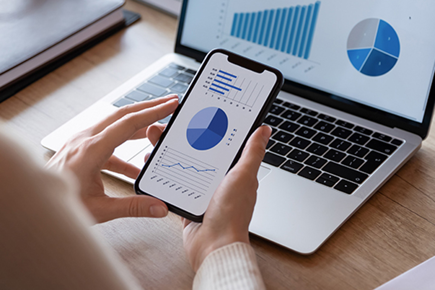 Sureprep Portrait 2 charts on laptop and phone