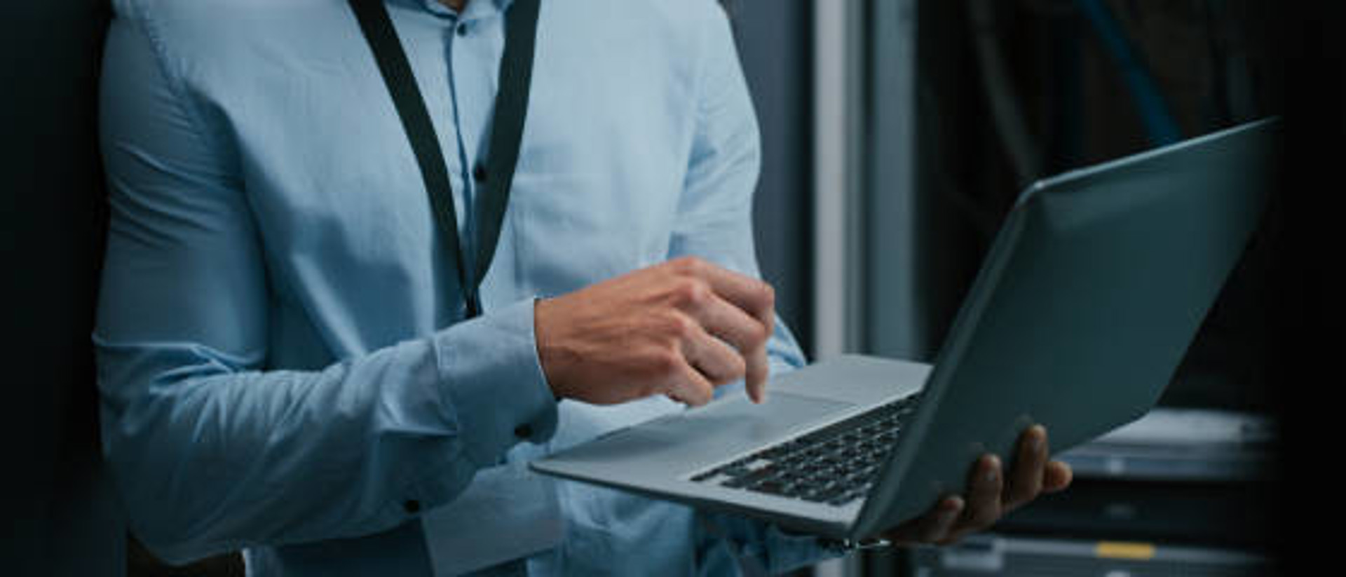 Redstor Header 1 Man typing on laptop