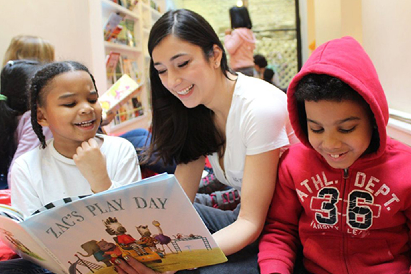 woman reading to children