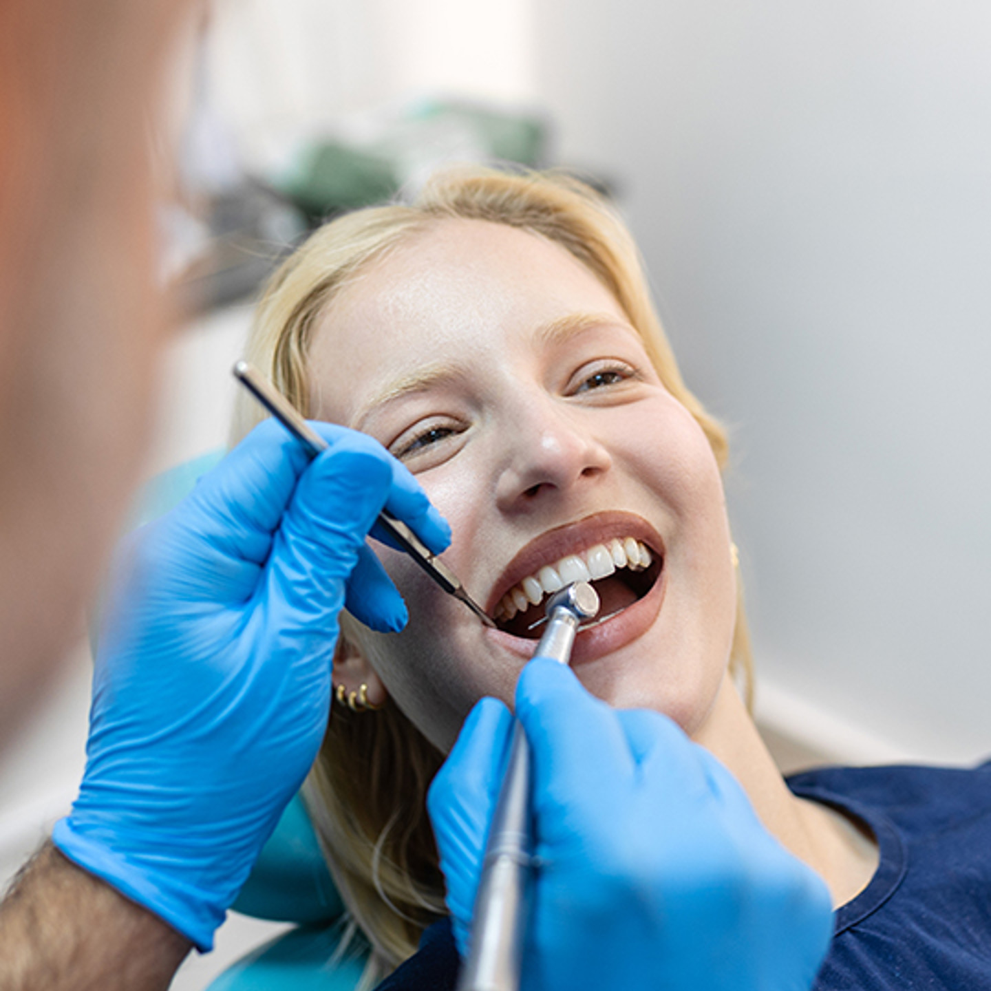 Dentalxchange Portrait 3 Patient being seen by dentist