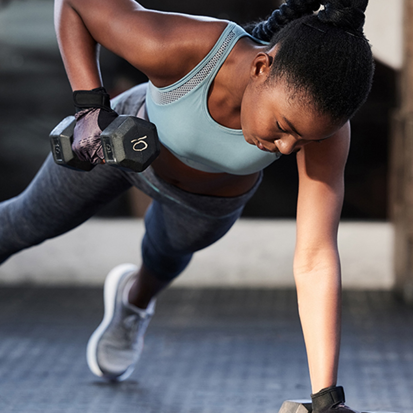 CDM Fitness Portrait 2 woman planking and lifting weights