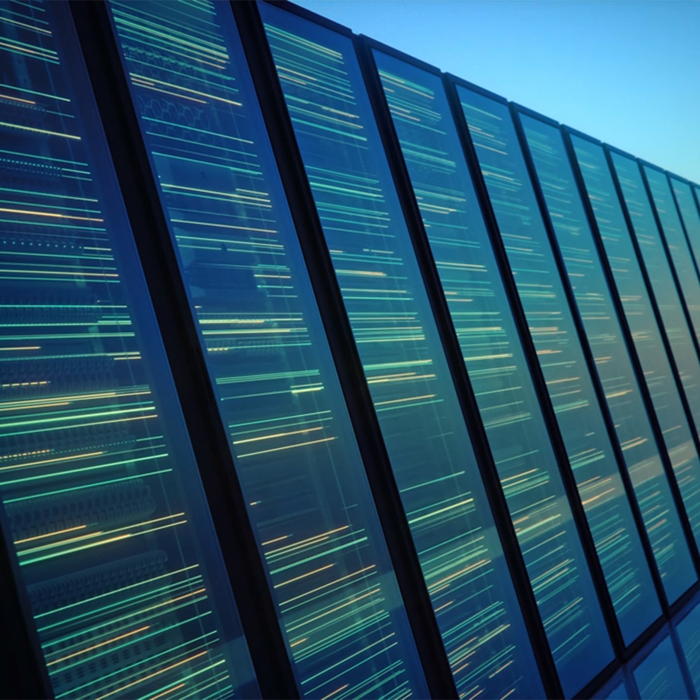 Image of data centre with lights on monitors
