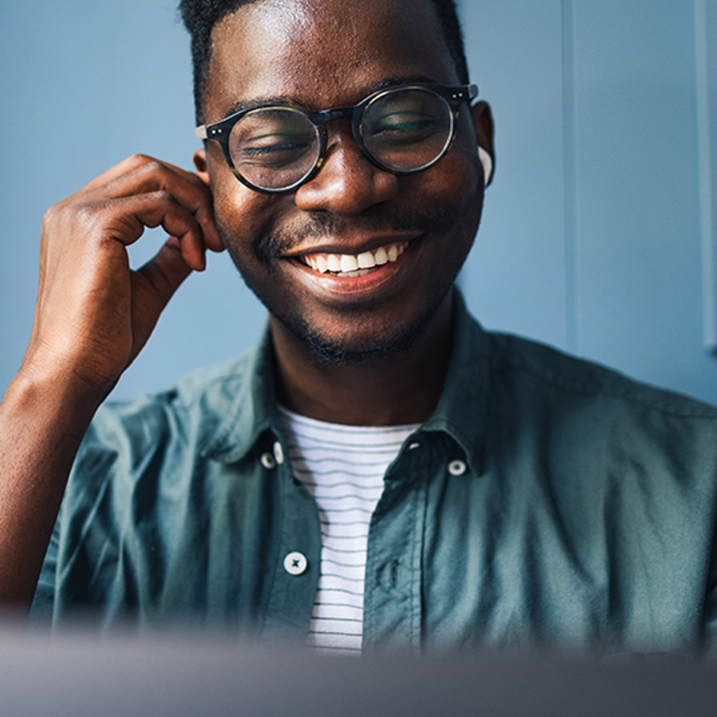 Anywhere 365 Portrait 2 man with earphones smiling