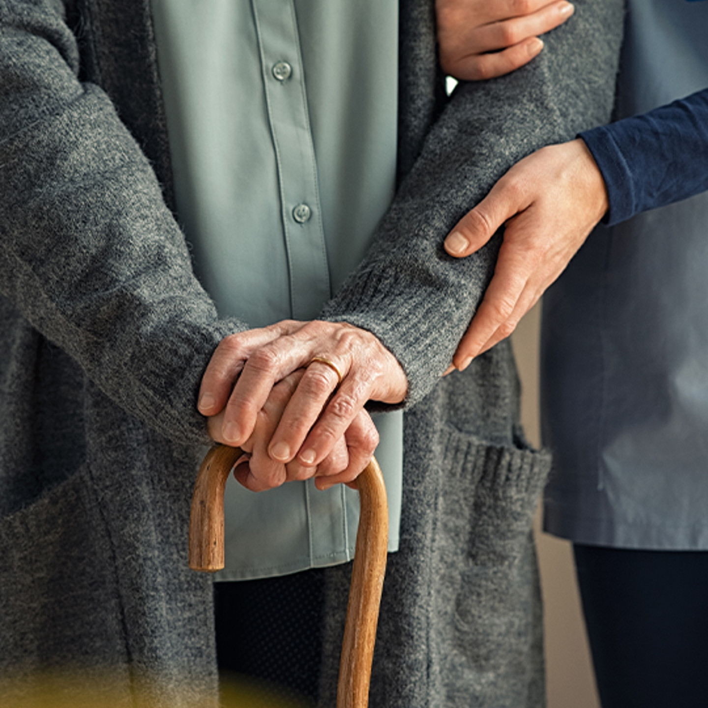 TEAM Portrait 1 old person holding onto walking stick