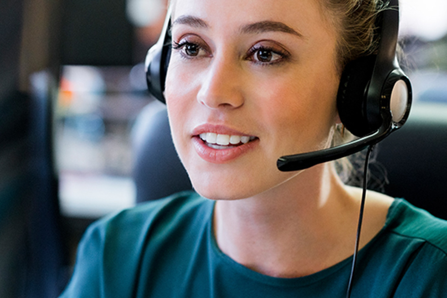 Anywhere 365 Portrait 1 woman with headset on
