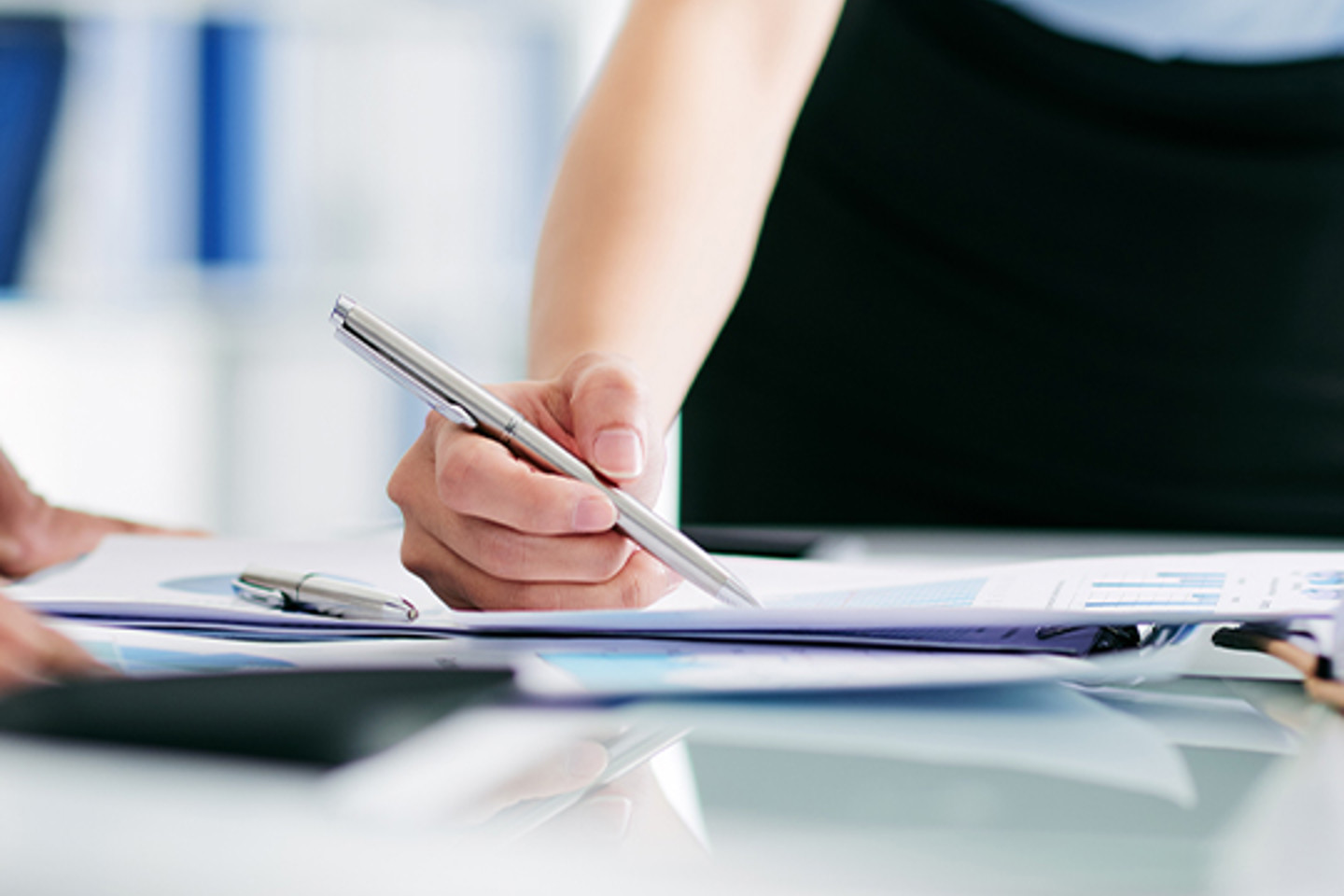 Optima Portrait 2 woman using pen